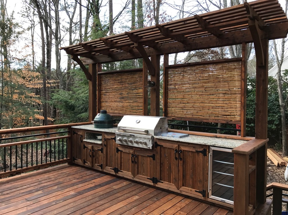 Mid-sized contemporary backyard deck in Atlanta with no cover.