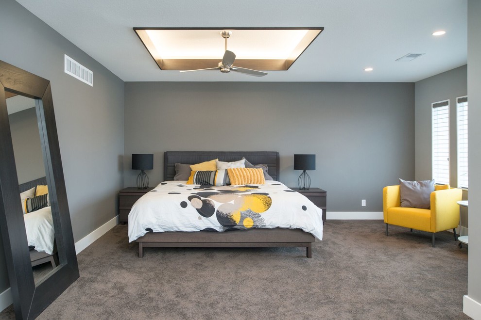 This is an example of a large contemporary master bedroom in Kansas City with grey walls, carpet, no fireplace and grey floor.