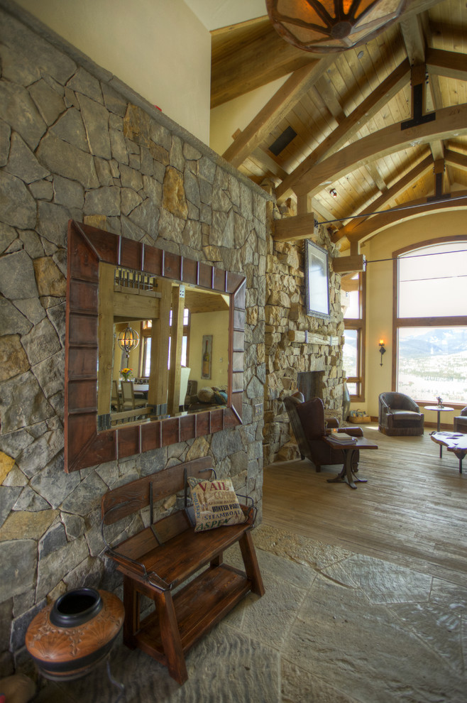 Mountain style foyer photo in Denver