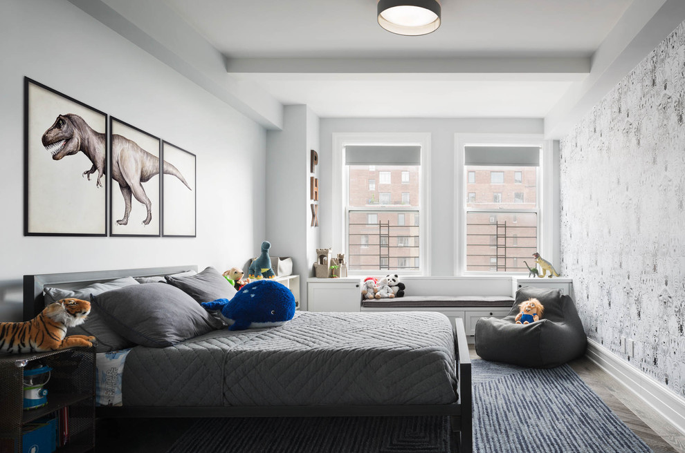 Inspiration for a contemporary kids' bedroom for kids 4-10 years old and boys in New York with white walls, dark hardwood floors and brown floor.