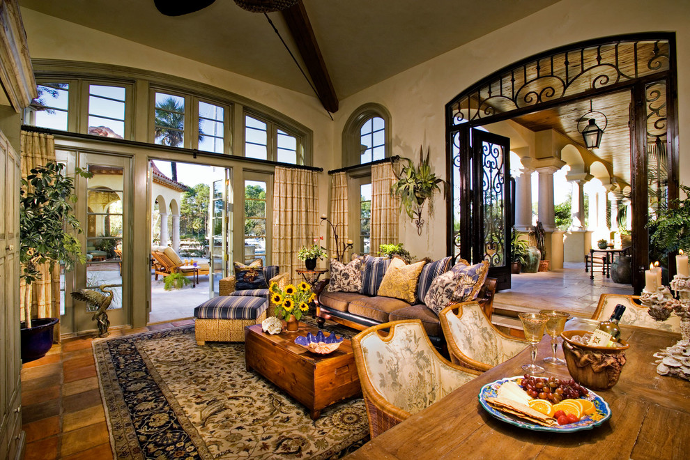 Inspiration for a large mediterranean sunroom in Atlanta with terra-cotta floors and a standard ceiling.