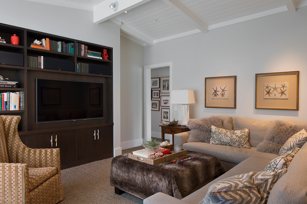 Photo of a transitional enclosed living room in San Francisco with carpet, a built-in media wall and grey walls.