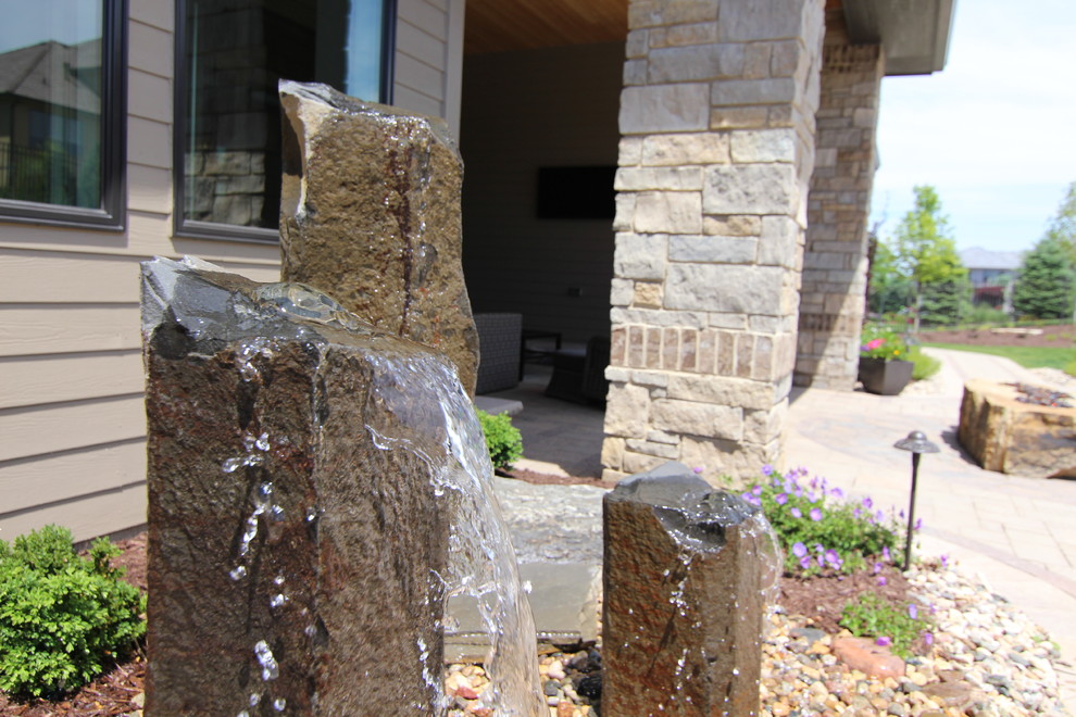 Mountain style entryway photo in Omaha