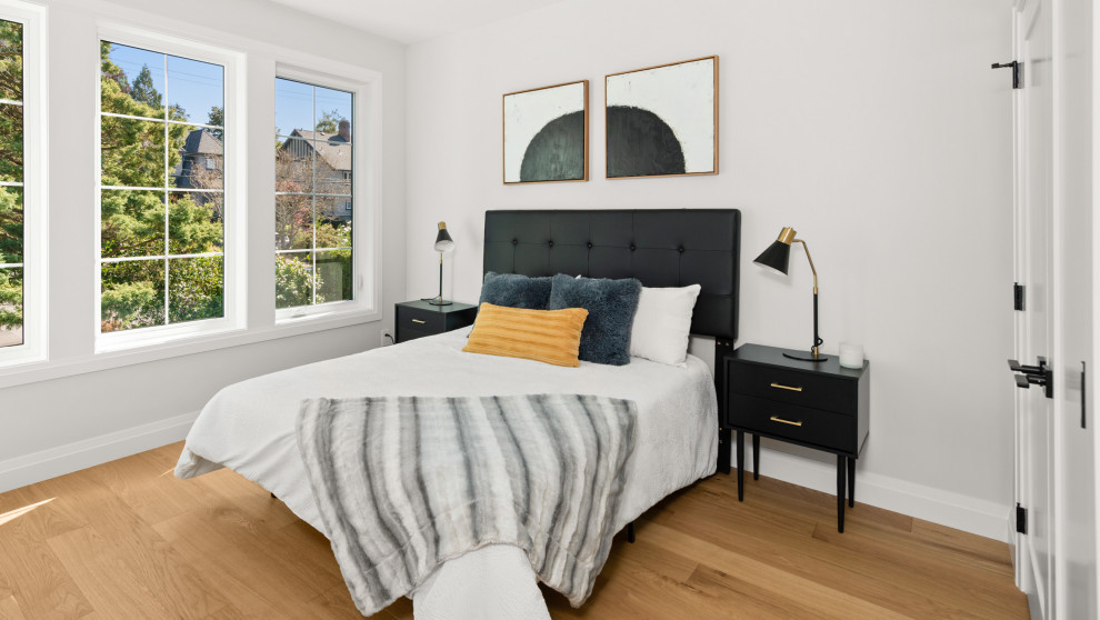 Example of a transitional home design design in Vancouver