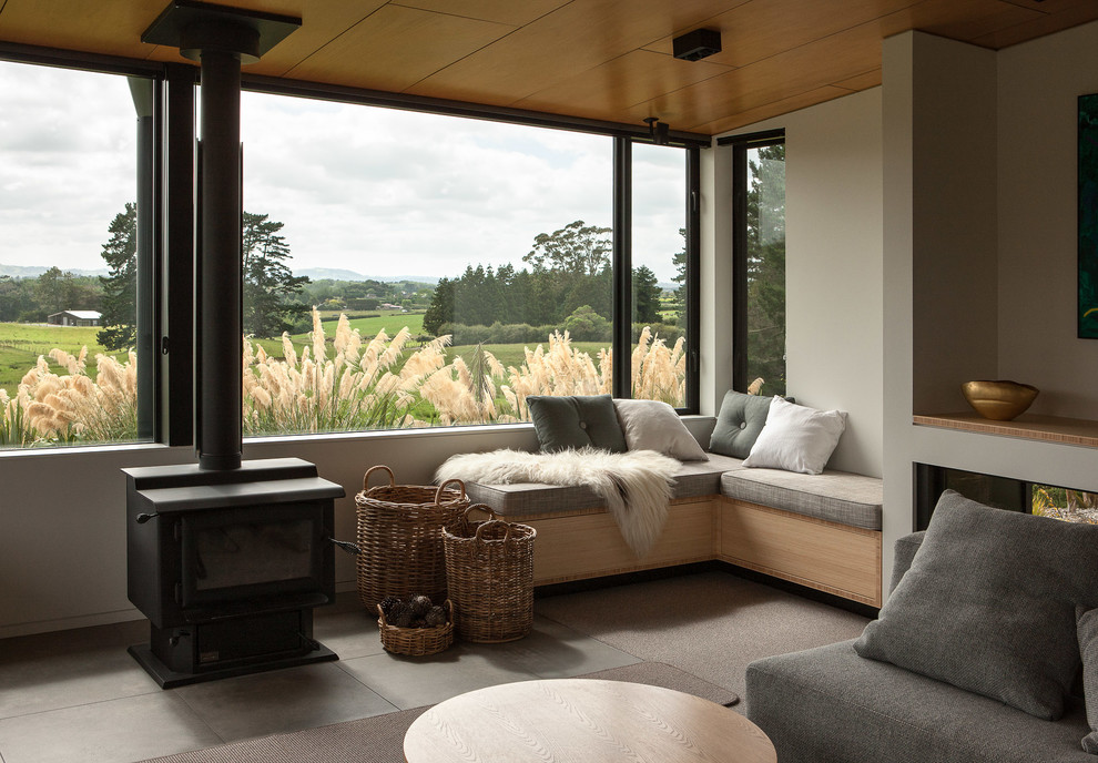 Inspiration for a mid-sized contemporary open concept living room in Auckland.