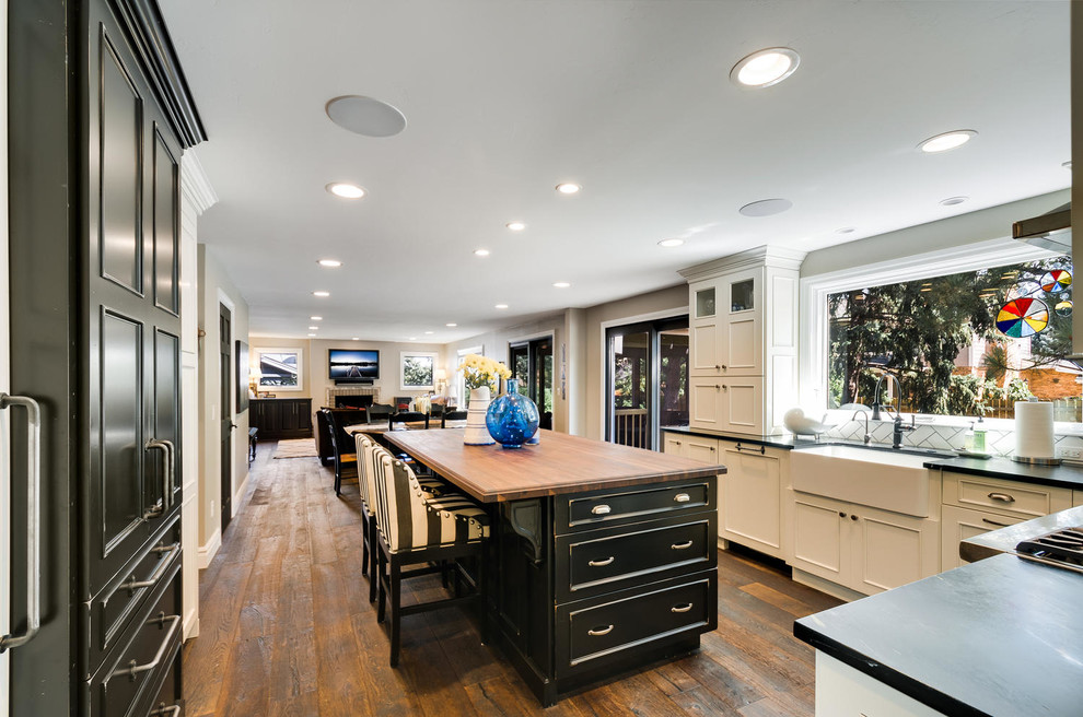 Example of a transitional kitchen design in Denver