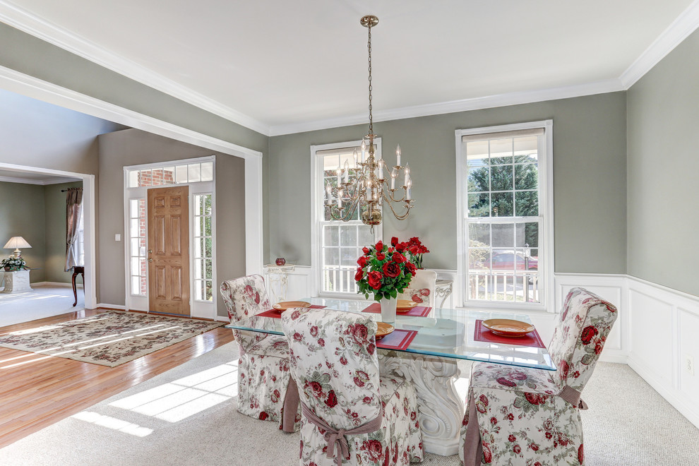 This is an example of a large transitional separate dining room in DC Metro with grey walls, carpet and beige floor.