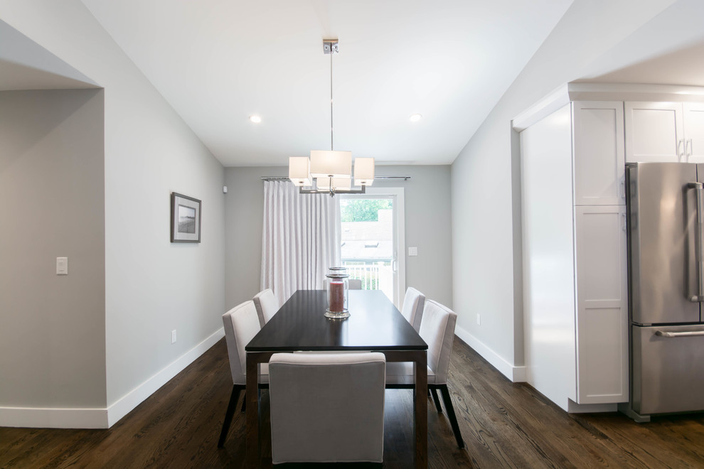 Inspiration for a mid-sized transitional open plan dining in Providence with grey walls, dark hardwood floors, no fireplace and brown floor.