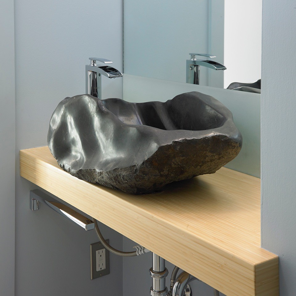 This is an example of a small contemporary powder room in Vancouver with a vessel sink, wood benchtops and grey walls.