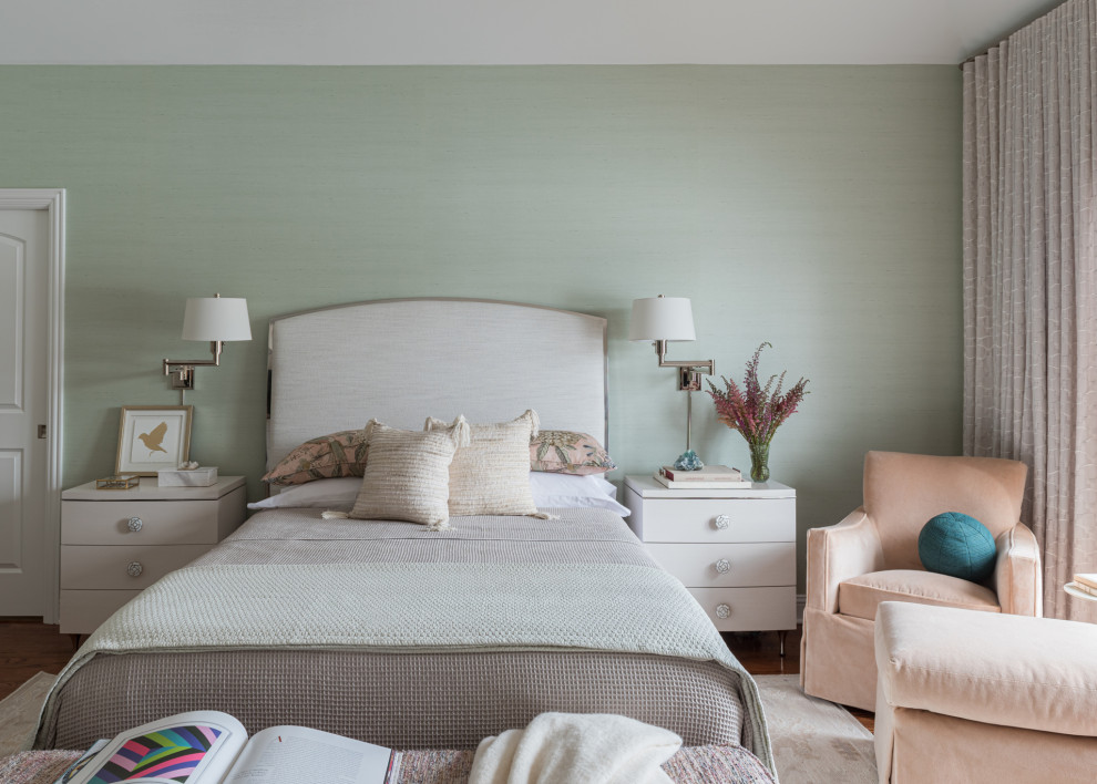 Design ideas for a large classic master bedroom in Chicago with green walls, dark hardwood flooring and wallpapered walls.