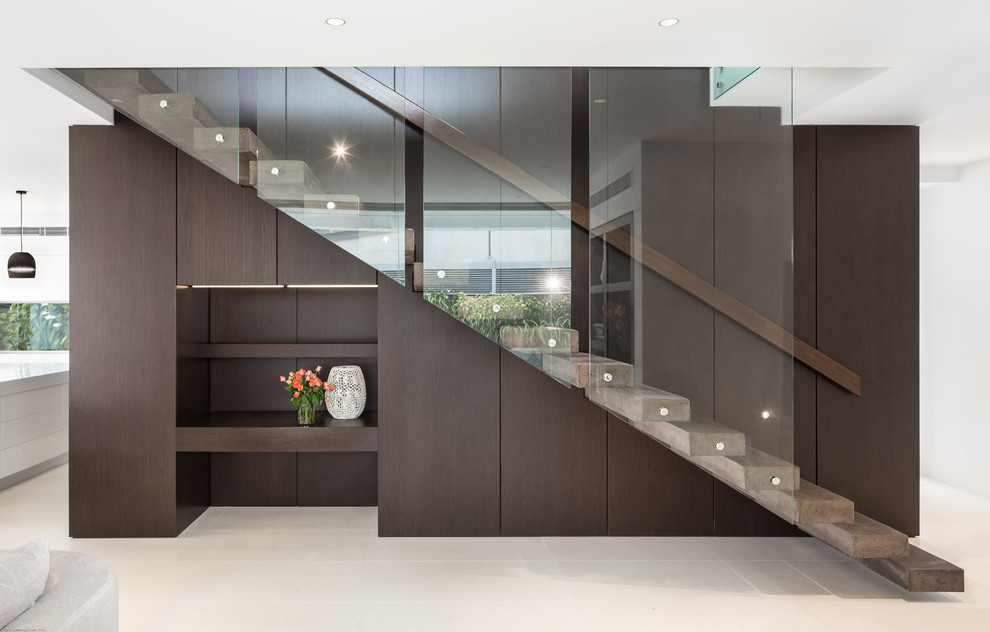 Design ideas for a contemporary concrete floating staircase in Brisbane.