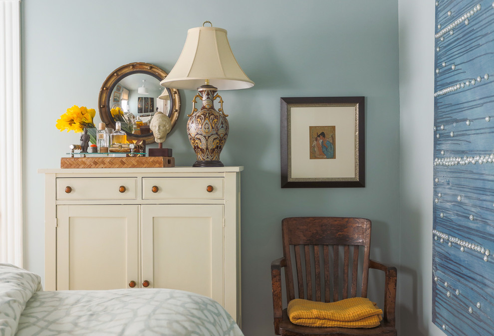 Design ideas for a mid-sized eclectic guest bedroom in Boston with blue walls, medium hardwood floors and no fireplace.