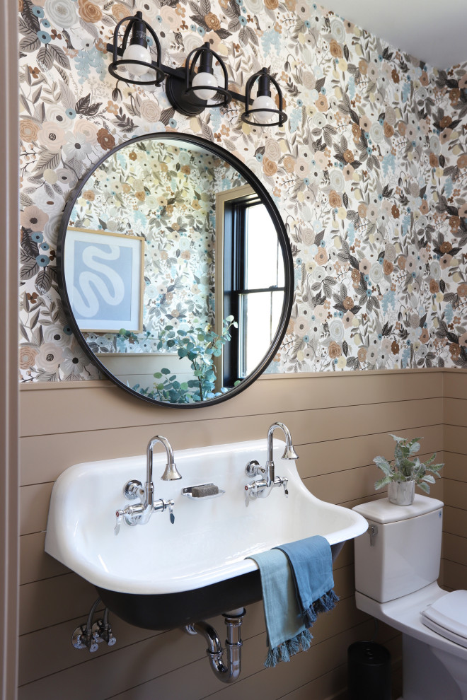 Photo of a beach style powder room in Grand Rapids.