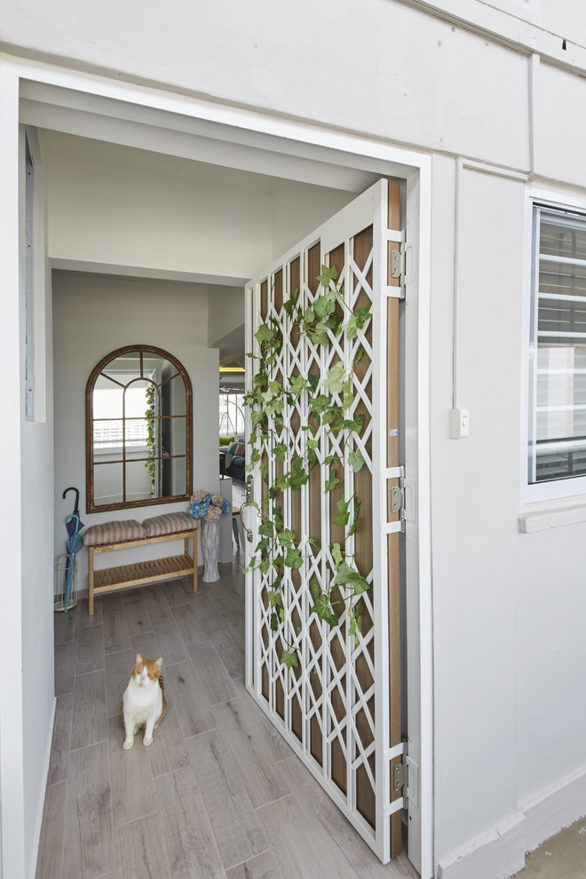 Design ideas for a large scandinavian entryway in Singapore.