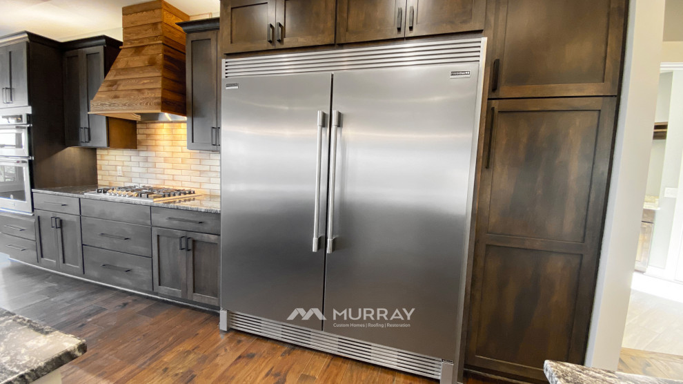 Kitchen - rustic kitchen idea in Omaha