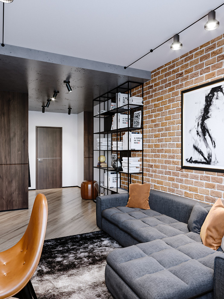 This is an example of a mid-sized industrial formal loft-style living room in Frankfurt with white walls, laminate floors, no fireplace, a freestanding tv and beige floor.