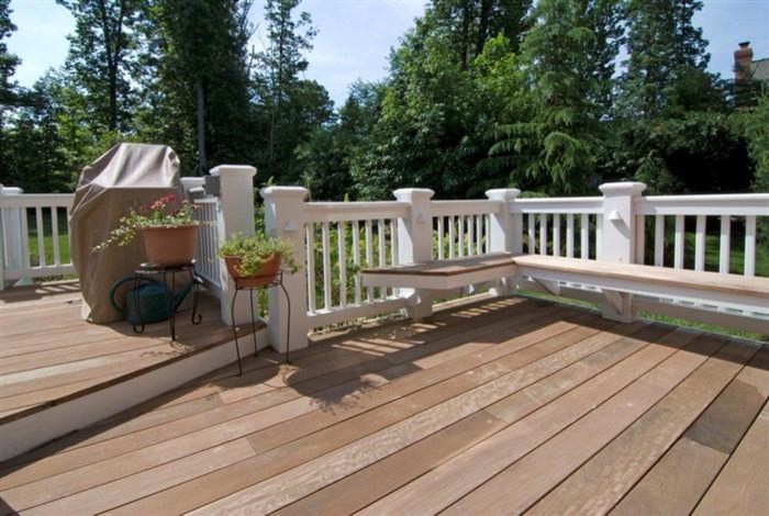 This is an example of a mid-sized traditional backyard deck in DC Metro with no cover.