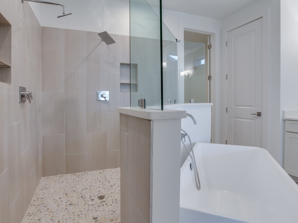 Design ideas for a mid-sized transitional master bathroom in Chicago with shaker cabinets, light wood cabinets, a freestanding tub, an open shower, beige tile, porcelain tile, yellow walls, pebble tile floors, an undermount sink and engineered quartz benchtops.
