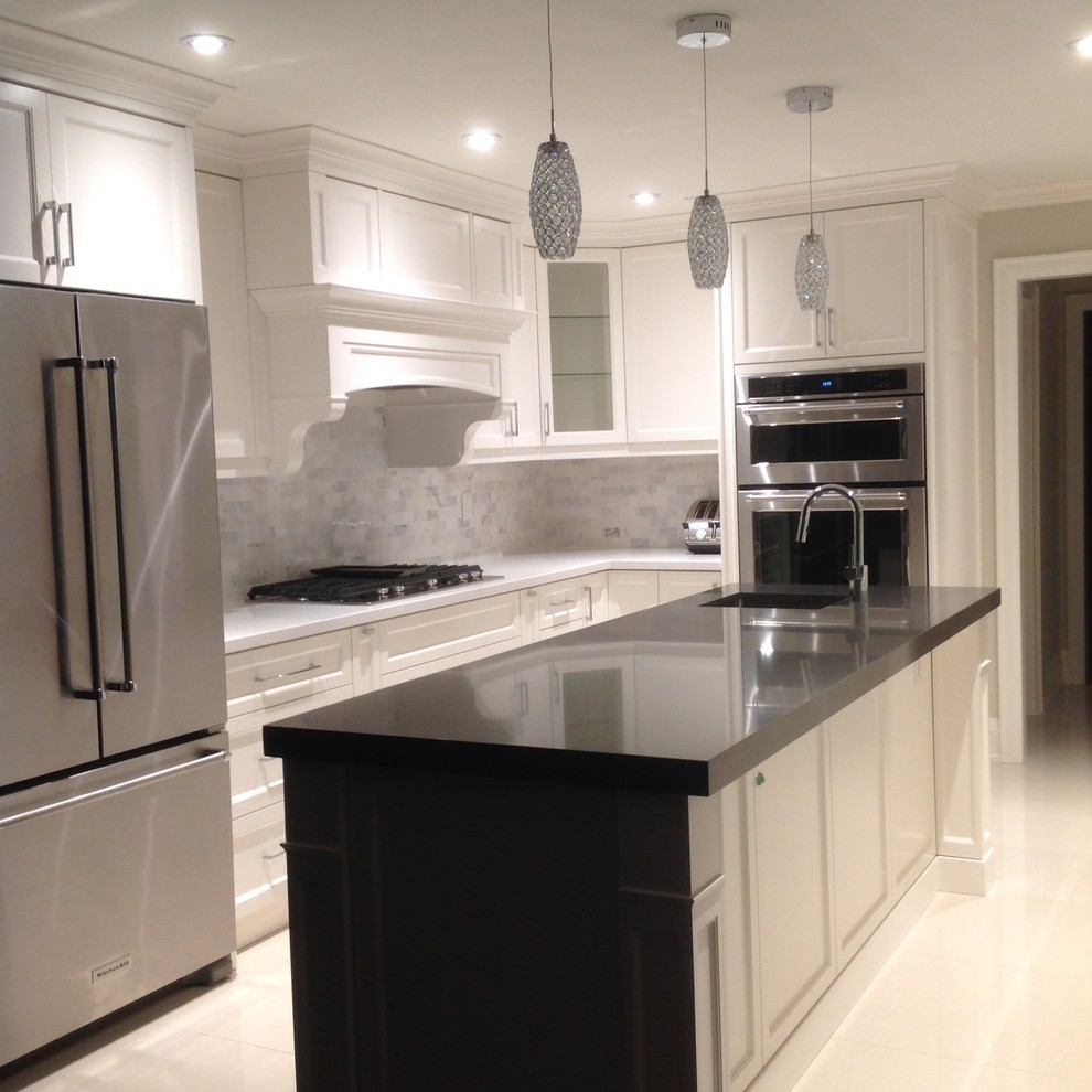 Inspiration for a transitional kitchen remodel in Toronto with marble backsplash