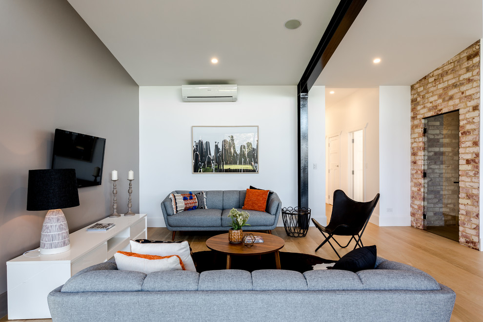 Design ideas for a contemporary living room in Adelaide.