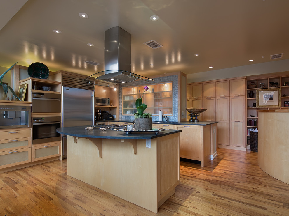 Photo of a contemporary kitchen in Denver with stainless steel appliances.