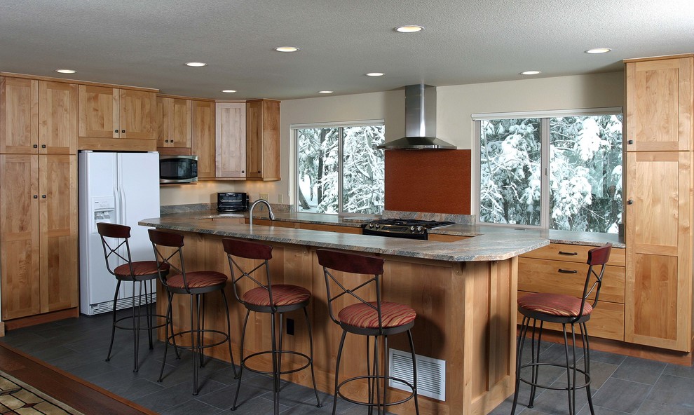 Open concept kitchen - mid-sized transitional galley slate floor open concept kitchen idea in Denver with an undermount sink, flat-panel cabinets, light wood cabinets, granite countertops, gray backsplash, stone slab backsplash and an island