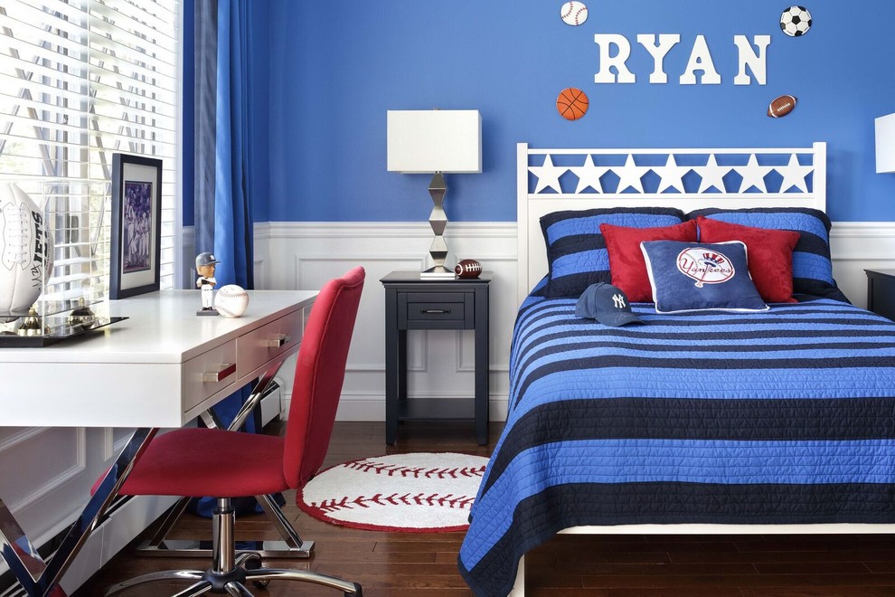 Design ideas for a mid-sized transitional kids' bedroom for boys and kids 4-10 years old in New York with blue walls, dark hardwood floors and brown floor.