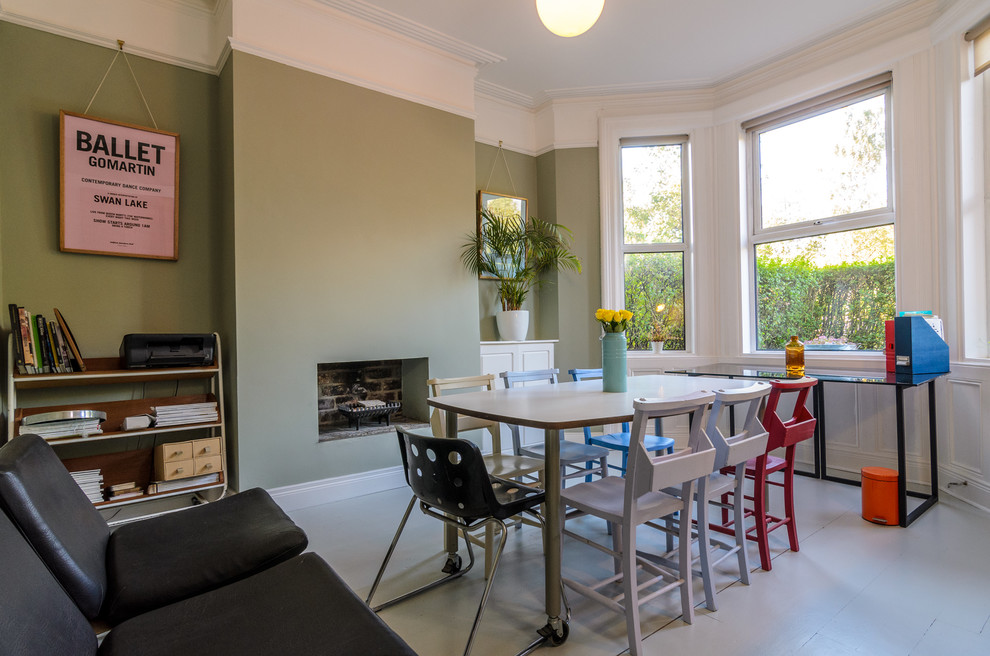 Inspiration for an eclectic dining room in Belfast with painted wood floors and white floor.