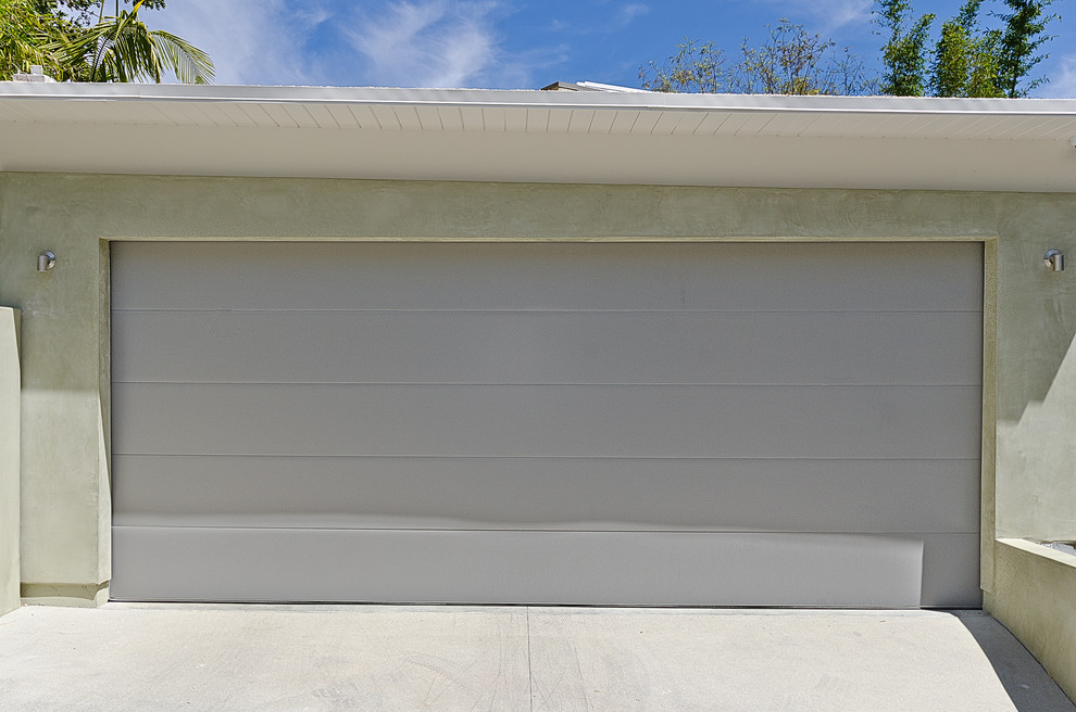 Photo of a mid-sized contemporary detached two-car carport in Los Angeles.