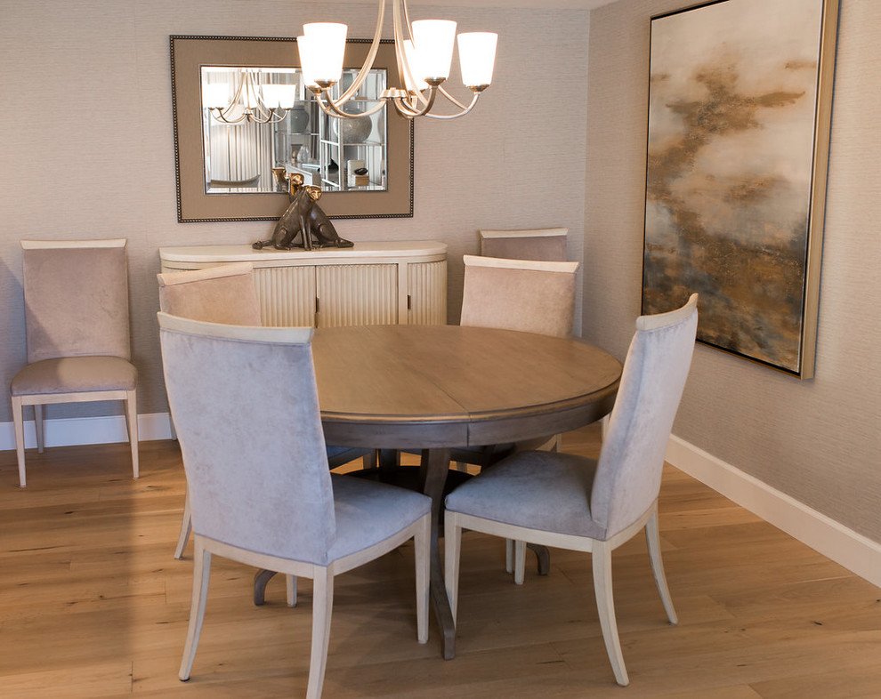 Inspiration for a small transitional medium tone wood floor and brown floor dining room remodel in Miami