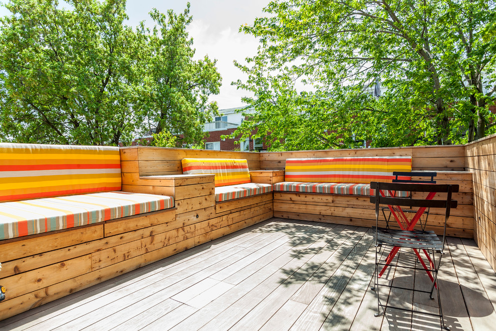 Contemporary deck in Montreal with no cover.