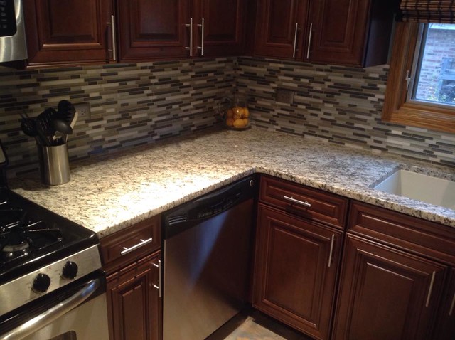 Giallo Ornamental Light Granite With An Oval Island