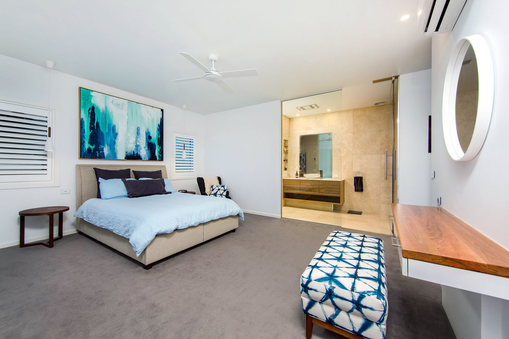 Design ideas for a large contemporary master bedroom in Sydney with white walls and carpet.