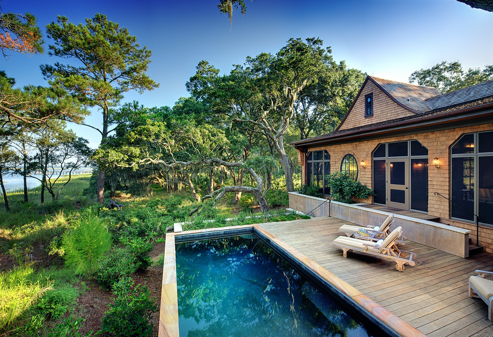 Photo of a traditional pool in Charleston with decking.