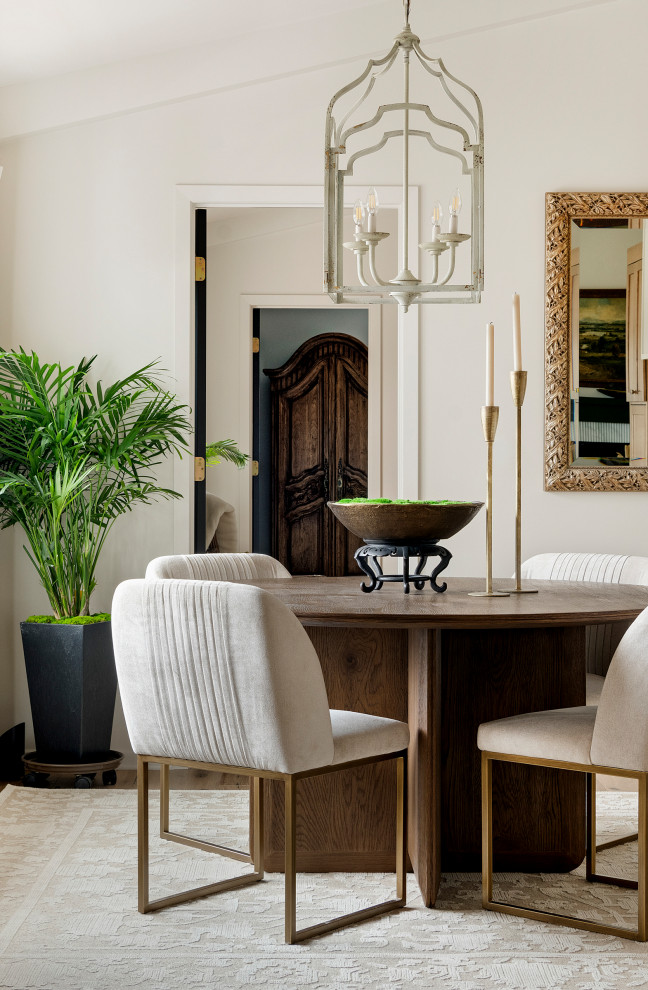 Mid-sized transitional medium tone wood floor, brown floor and vaulted ceiling kitchen/dining room combo photo in Minneapolis with white walls and no fireplace