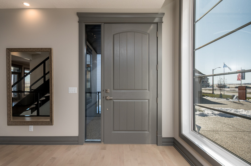 Transitional home design photo in Calgary