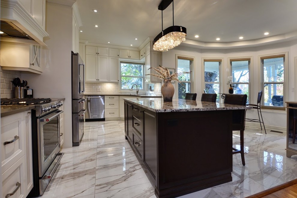 Example of a transitional kitchen design in Toronto
