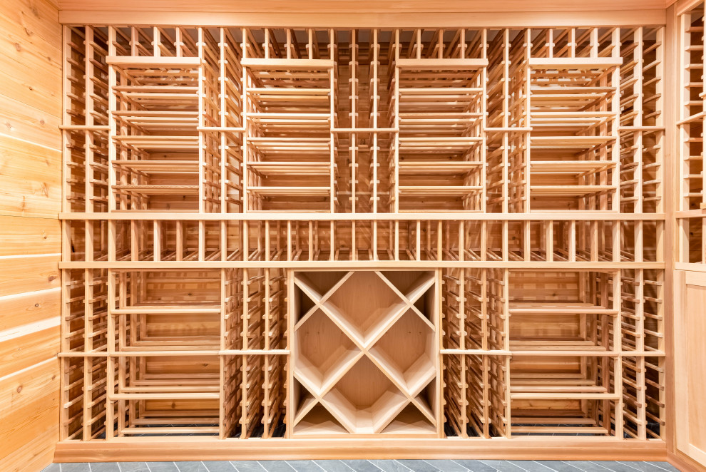 Design ideas for a country wine cellar in Charlotte.