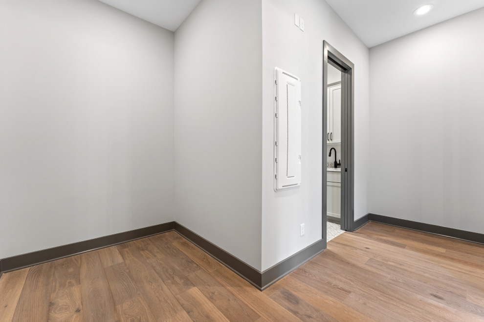 Example of a transitional home design design in Miami