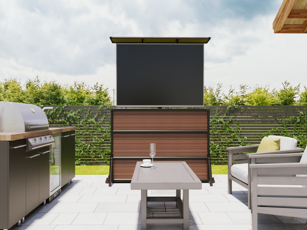 Outdoor kitchen patio entertainment with TV lift cabinet