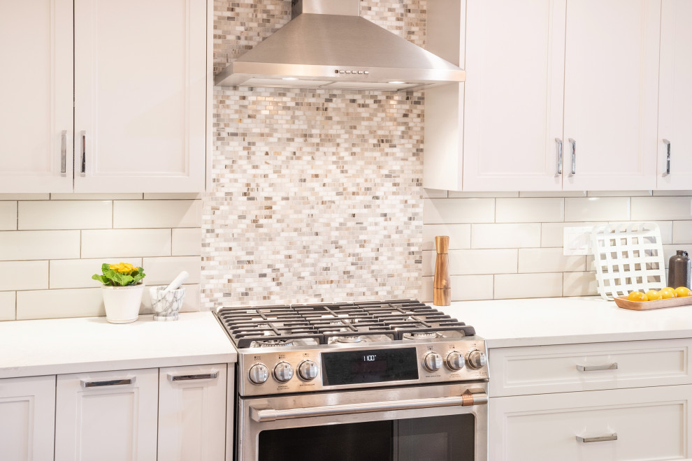 Example of a transitional kitchen design in Vancouver