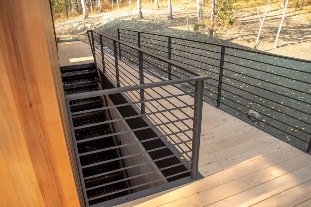 Photo of a large contemporary metal railing terrace in Other.