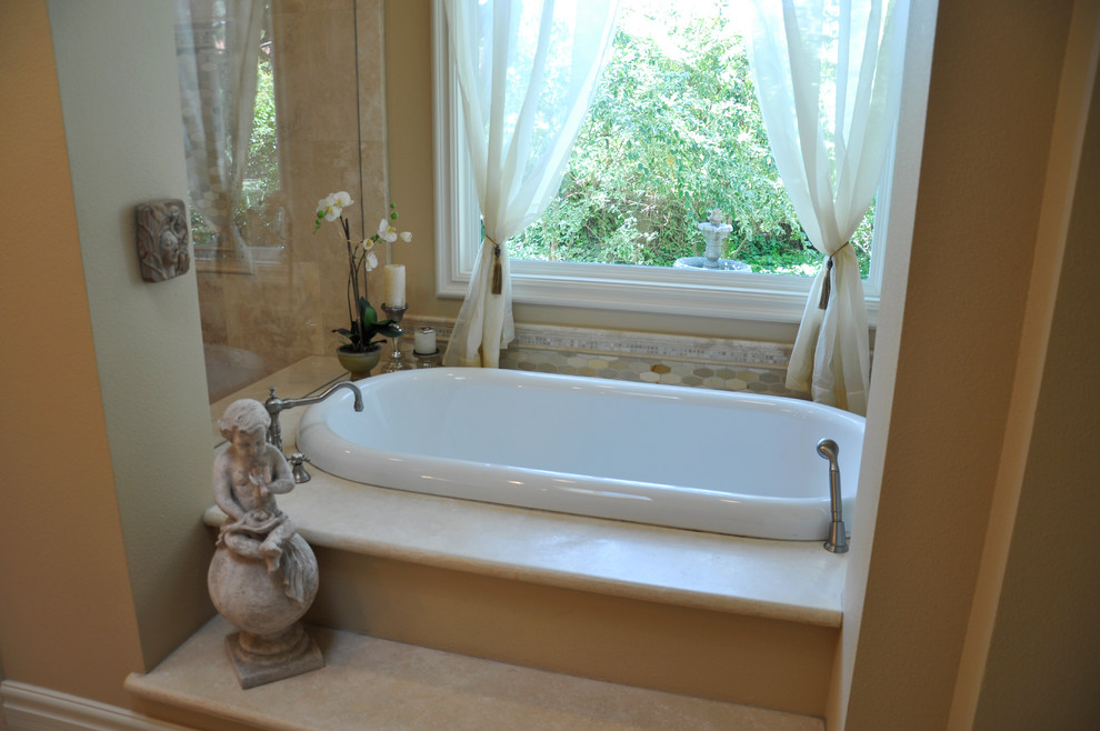 Drop-in bathtub - large transitional master drop-in bathtub idea in Orange County with brown walls