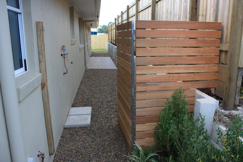 This is an example of a contemporary garden in Brisbane.