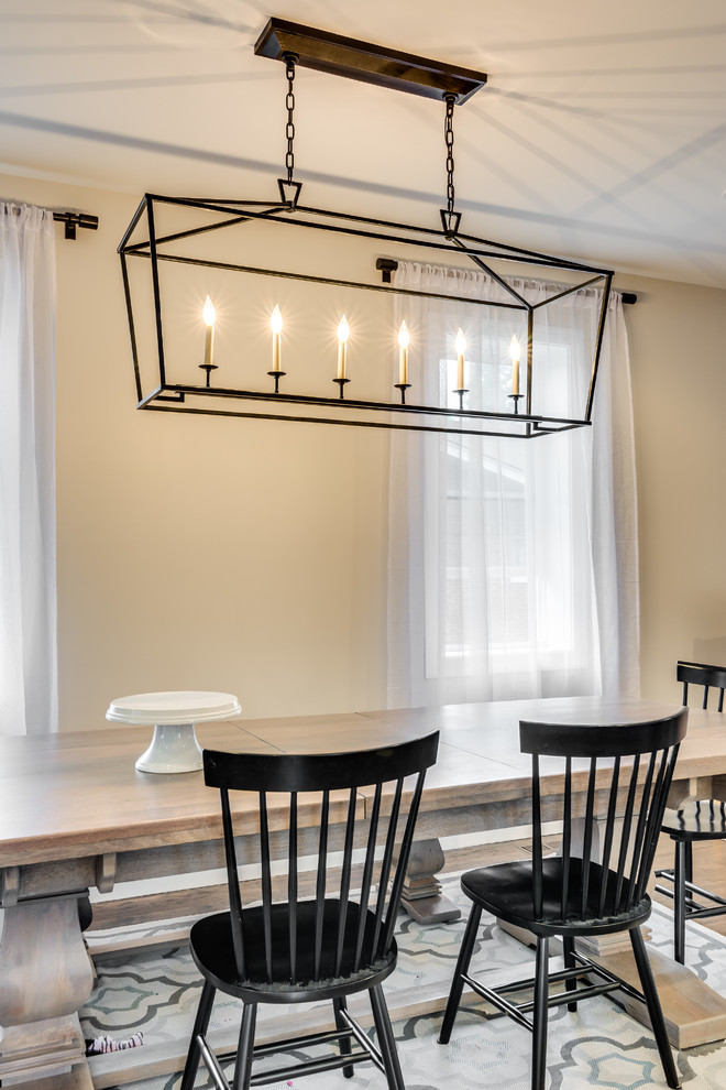 Example of a transitional dining room design in Chicago