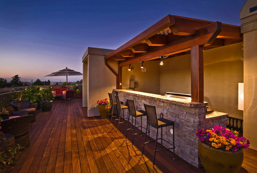 Inspiration for a large traditional backyard deck in San Francisco with a pergola.