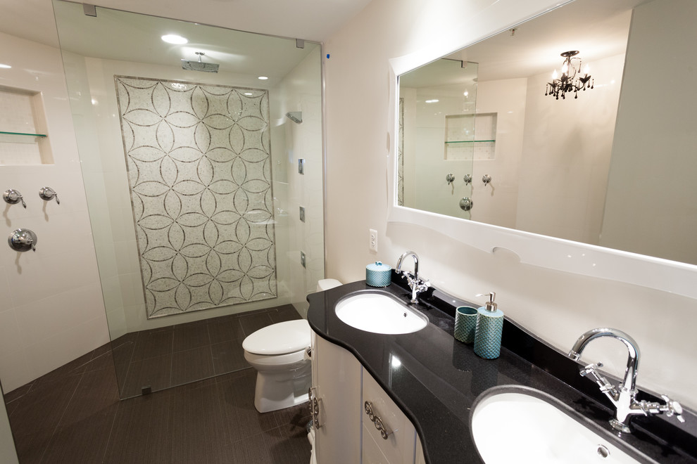 Inspiration for a mid-sized contemporary master bathroom in DC Metro with furniture-like cabinets, white cabinets, a curbless shower, beige tile, mosaic tile, white walls, ceramic floors, an integrated sink, granite benchtops, brown floor and an open shower.