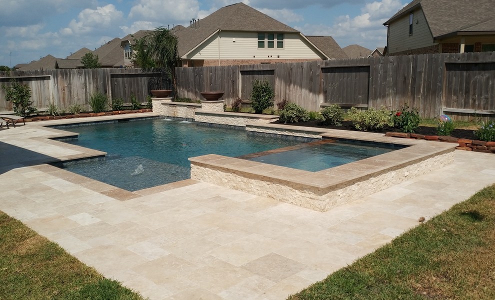 Inspiration for a large transitional backyard stone and rectangular lap hot tub remodel in Houston