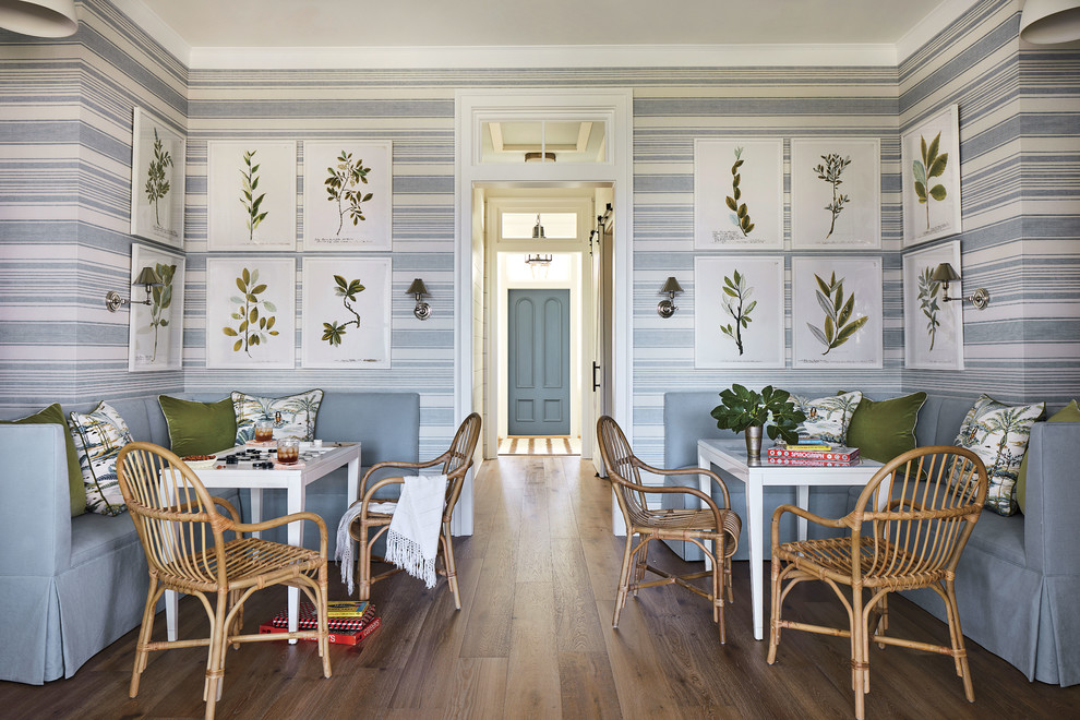 Inspiration for a small beach style dining room in Jacksonville with multi-coloured walls and dark hardwood floors.