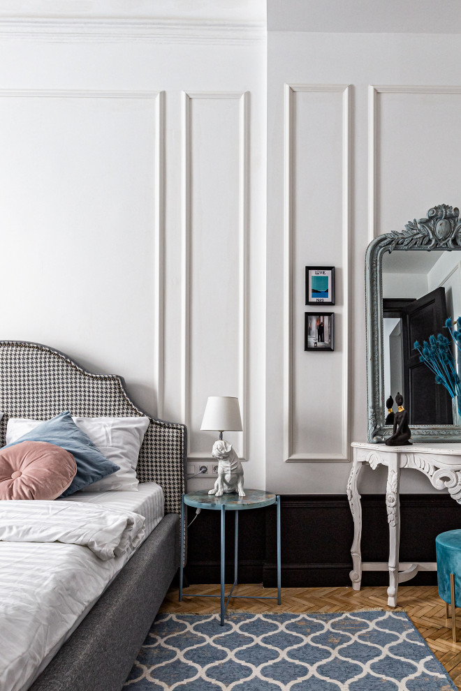 Medium sized midcentury master bedroom in Saint Petersburg with white walls, medium hardwood flooring and brown floors.
